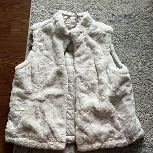 BRAND NEW Reversible vest. Cream/ off white color. Size XL. Worn once.